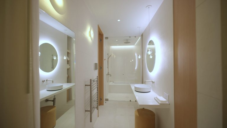 wide view of elements of modern bathroom with shower in home real estate interior move SBI 349475454 768x432
